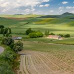 Green rolling hills and farmland in the Spanish countryside