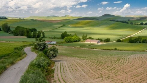 Green rolling hills and farmland in the Spanish countryside
