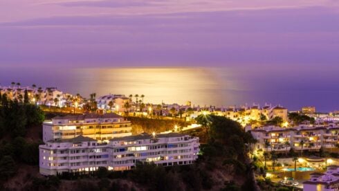 Marbella at sunset with a purple sky behind