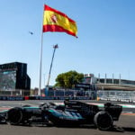 Kimi Antonelli in a Mercedes F1 car in front of the Spanish flag at the Madring