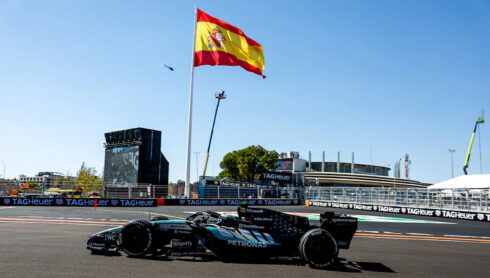 Kimi Antonelli in a Mercedes F1 car in front of the Spanish flag at the Madring