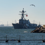 The USS John Basilone, an Arleigh Burke-class guided-missile destroyer, arrives at the US and Spanish naval base at Rota